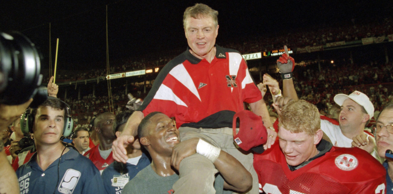 Nebraska players carry Tom Osborne off the field after the Huskers defeated Miami 24-17 in the 1995 Orange Bowl (AP Photo/Doug Mills)